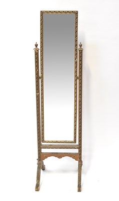 Lot 65 - An early 20th century gilt painted carved...