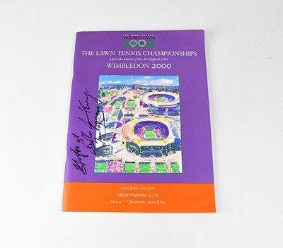 Lot 416 - WIMBLEDON 2000; an official programme signed...