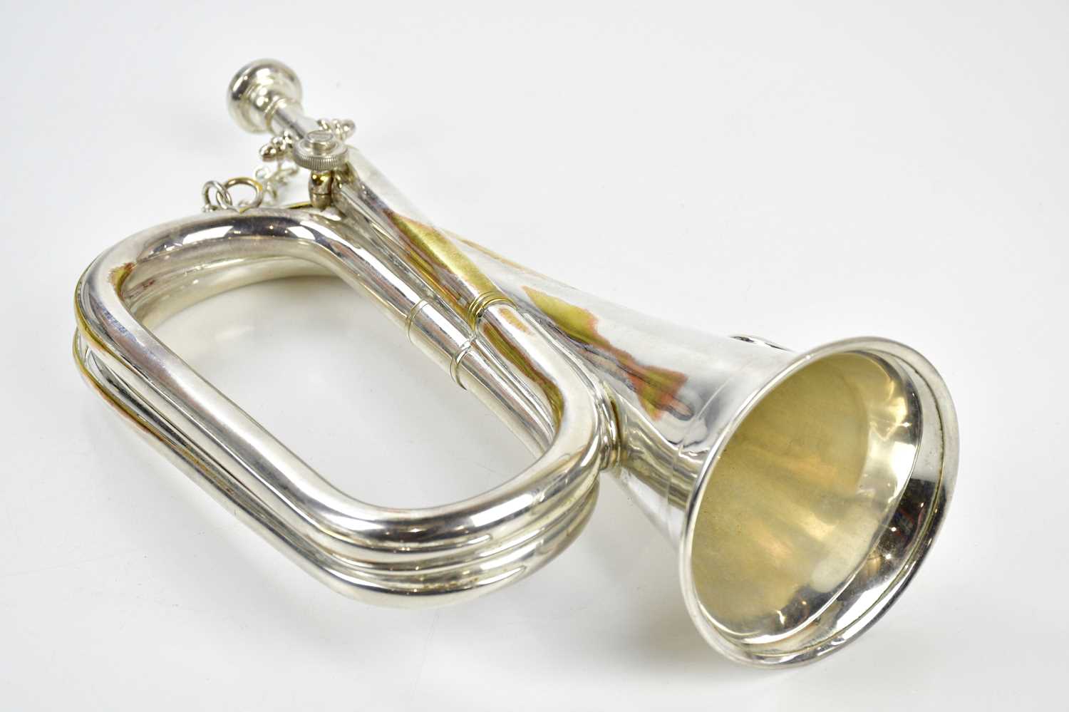 Lot 1304 - M.H; a silver plated bugle, 32cm, S.N: 4714.