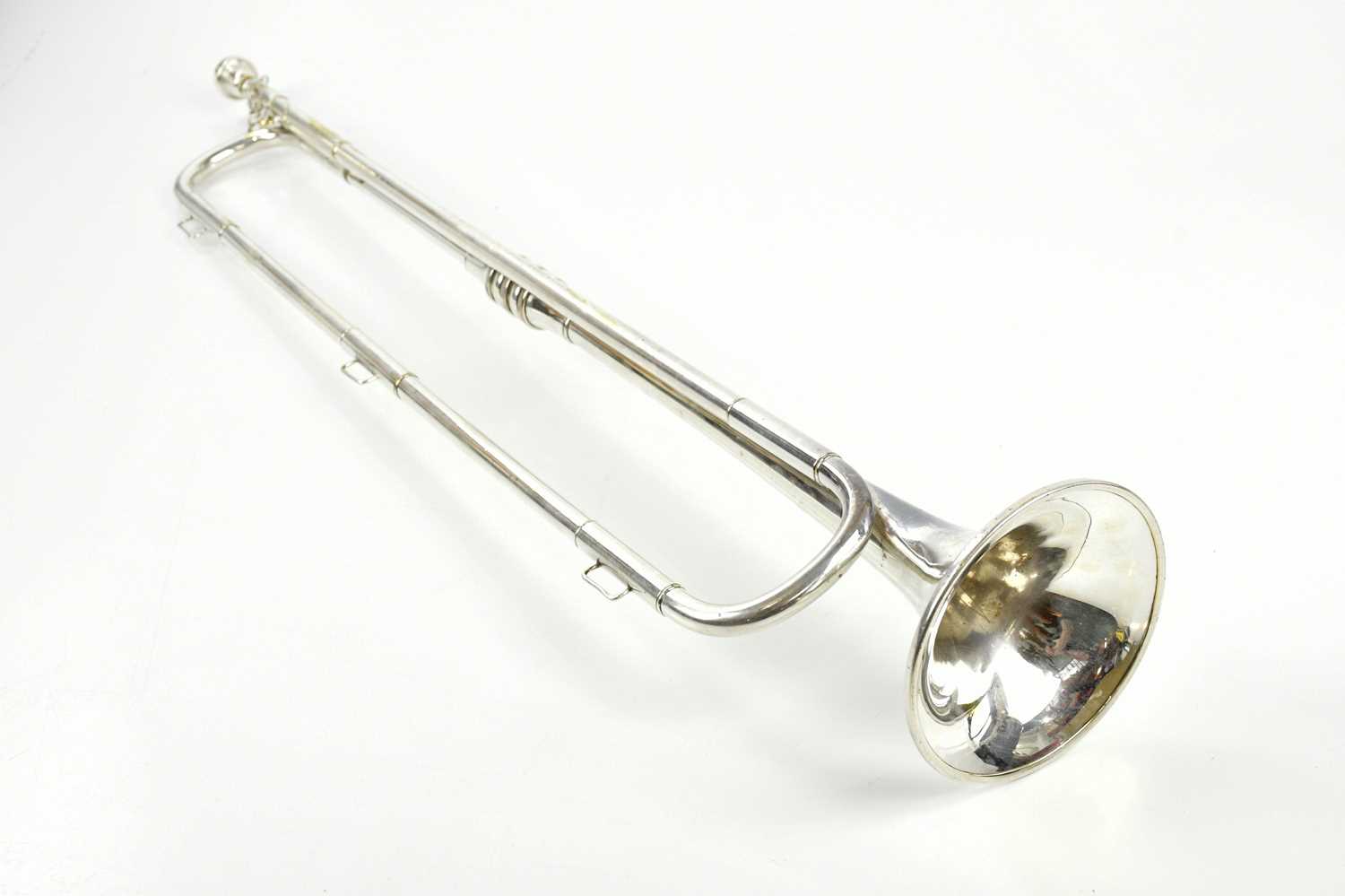 Lot 1311 - PREMIER; a silver plated bugle, 76cm.