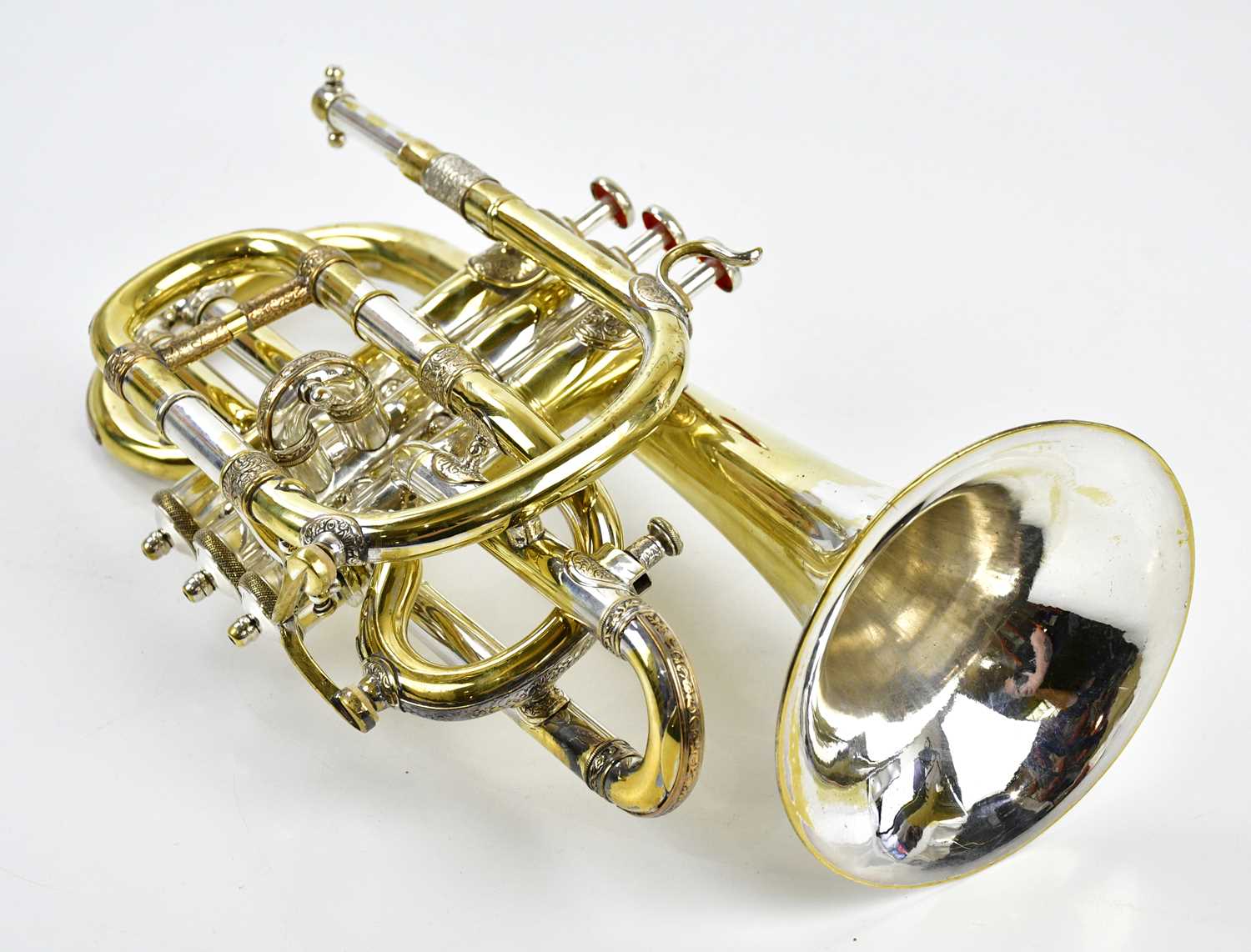Lot 1302 - J.W. MOORE; a brass cornet, 32cm, lacking...