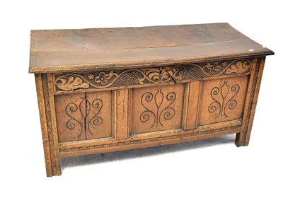 Lot 22 - An 18th century oak triple panel coffer