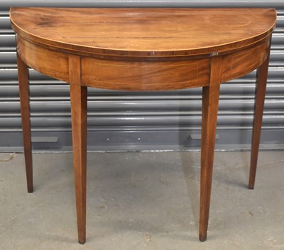 Lot 75 - A 19th century mahogany demi-lune card table,...