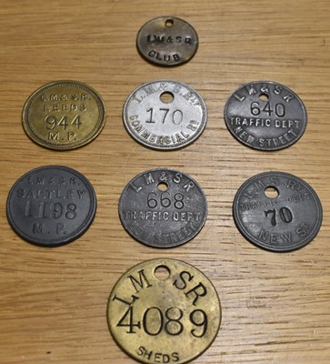 Lot 246 - LM&SR; eight assorted tokens/tallies.