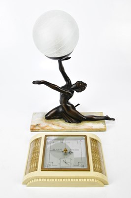 Lot 355 - An Art Deco style lamp with a lady on marble...