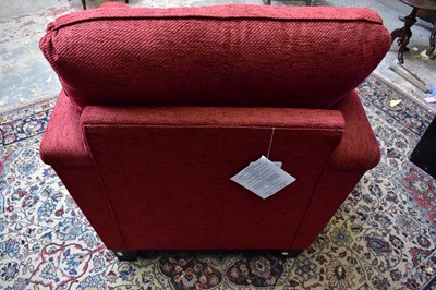 Lot 2674 - A modern red upholstered lounge chair.