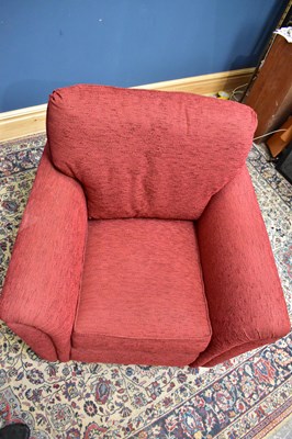 Lot 2674 - A modern red upholstered lounge chair.