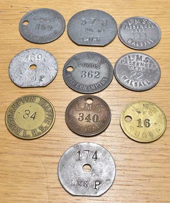 Lot 242 - LMS; ten assorted tokens/tallies.