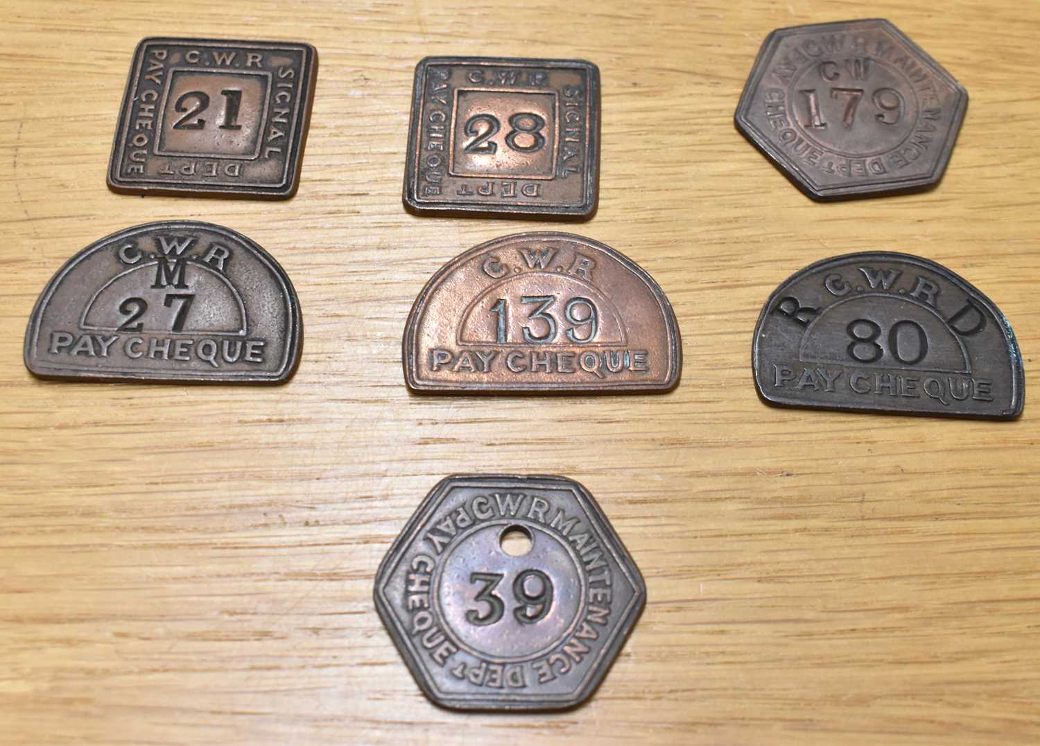 Lot 255 - GWR; seven assorted tokens/tallies.