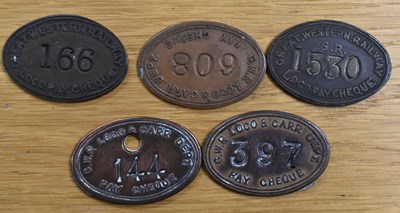 Lot 252 - GWR; five assorted tokens/tallies