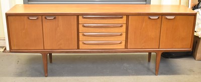 Lot 30 - G-PLAN; a long rectangular teak sideboard,...