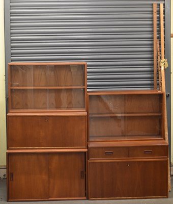 Lot 38 - A mid-century teak six part sectional wall...