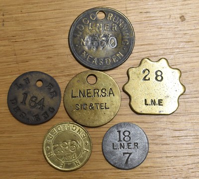 Lot 257 - LNER; six assorted tokens/tallies.