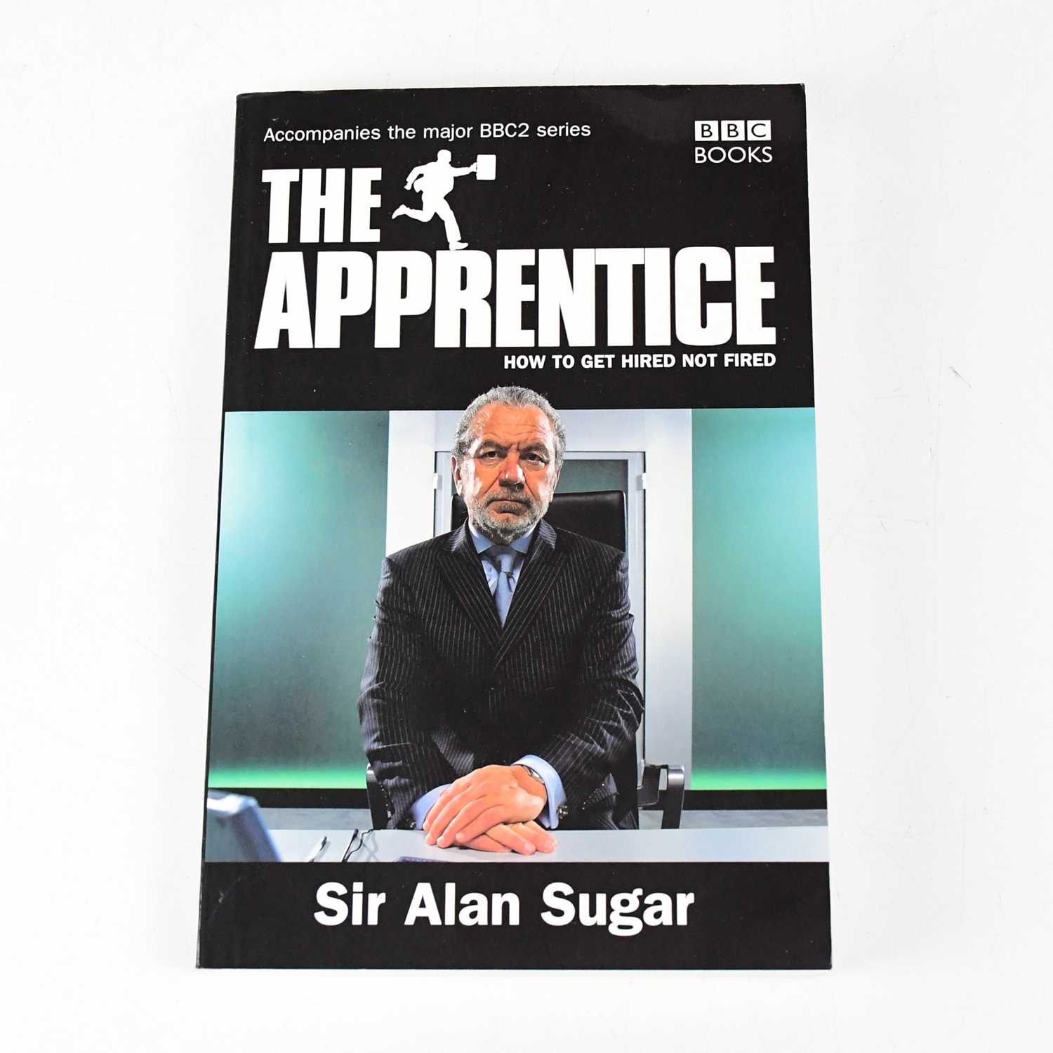 Lot 344 - ALAN SUGAR; book, 'The Apprentice', signed to...