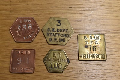 Lot 259 - BR; five assorted tokens/tallies.