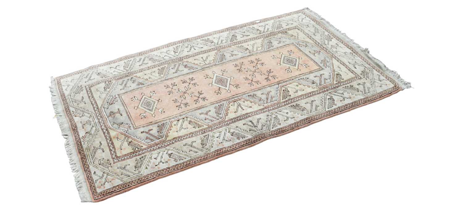 Eastern Style Rugs Lot 363 - Two Eastern style rugs, 123 x 226cm and 140