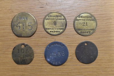 Lot 261 - BR; six assorted tokens/tallies.