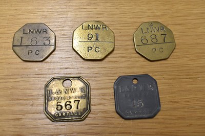 Lot 262 - LNWR; five assorted tokens/tallies.