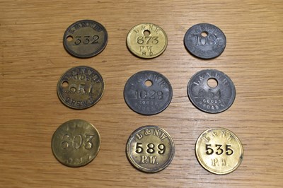 Lot 235 - LNWR; nine assorted tokens/tallies.