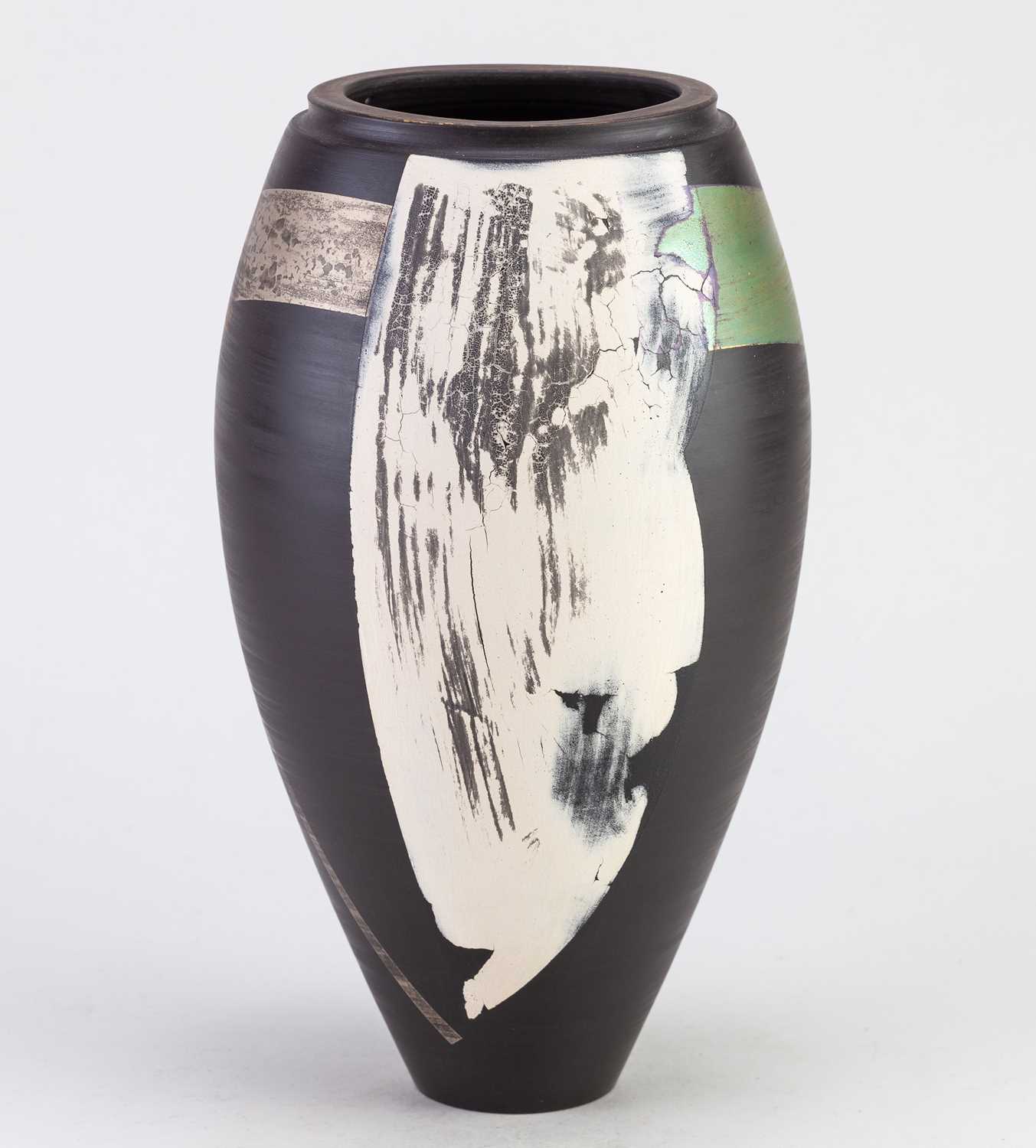 Lot 565 - TONY LAVERICK (born 1961); a black porcelain...