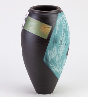 Lot 565 - TONY LAVERICK (born 1961); a black porcelain...