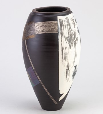 Lot 565 - TONY LAVERICK (born 1961); a black porcelain...