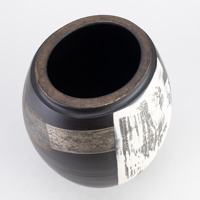 Lot 565 - TONY LAVERICK (born 1961); a black porcelain...