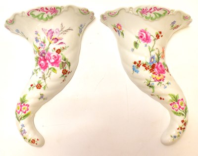 Lot 256 - ROYAL WORCESTER; a pair of porcelain floral...