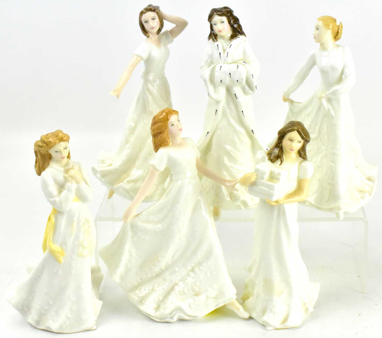 Lot 581 - ROYAL DOULTON; six porcelain figures, all...
