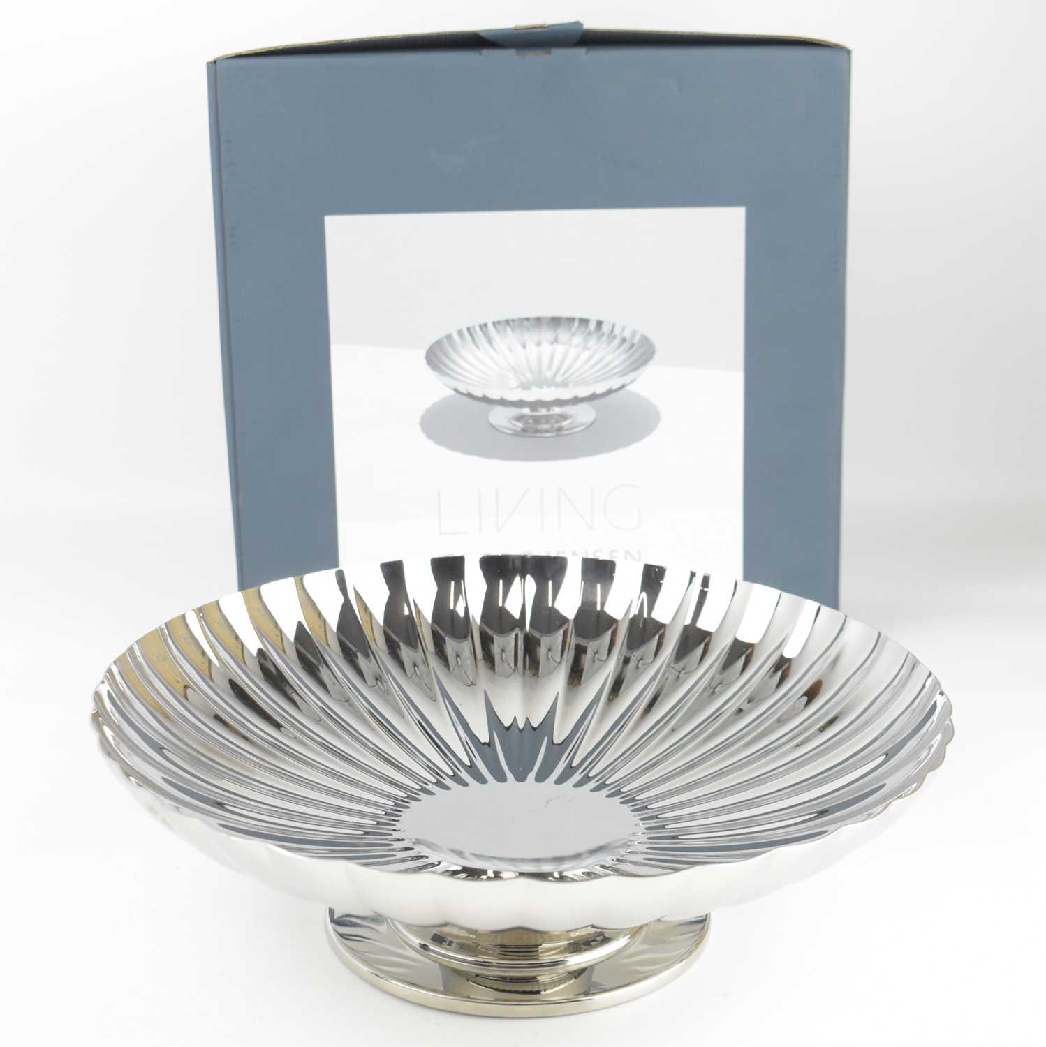 Lot 610 - GEORG JENSEN; a stainless steel dish on stand...