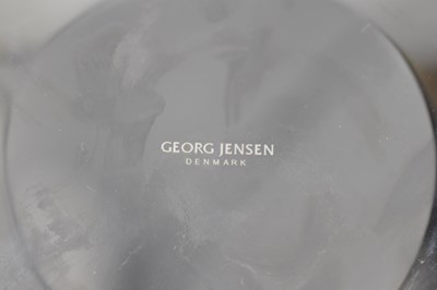 Lot 610 - GEORG JENSEN; a stainless steel dish on stand...