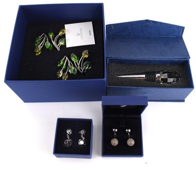 Lot 117 - SWAROVSKI; two pairs of boxed cufflinks, one...