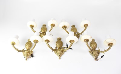 Lot 77 - Five brass two-branch wall sconces, with...