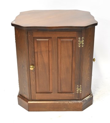 Lot 21 - A contemporary oak freestanding cabinet, with...