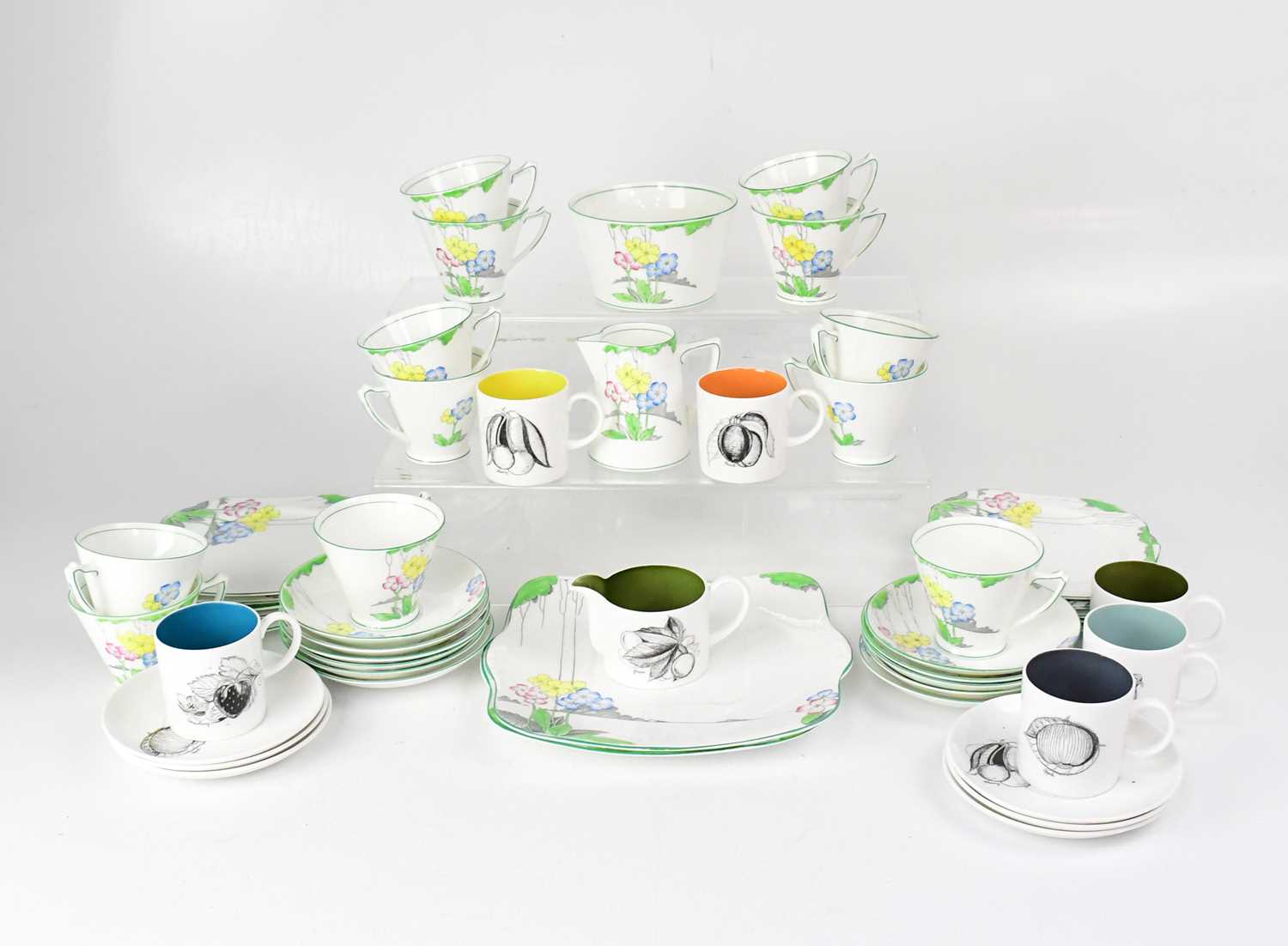 Lot 536 - SUSIE COOPER; a black fruit coffee set...