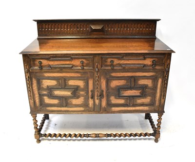 Lot 17 - An early 20th century oak sideboard, the...