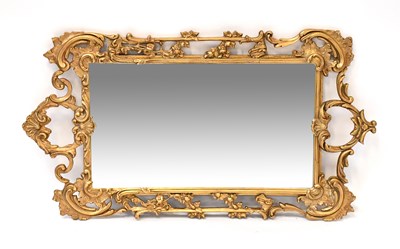 Lot 66 - A modern gilt wall mirror with pierced...