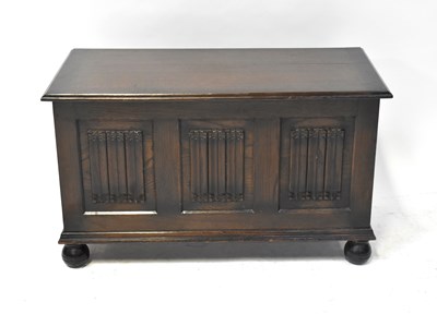 Lot 20 - An early 20th century oak cross-banded coffer,...