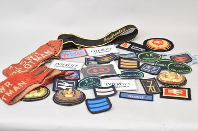 Lot 296 - A collection of fabric badges including four...