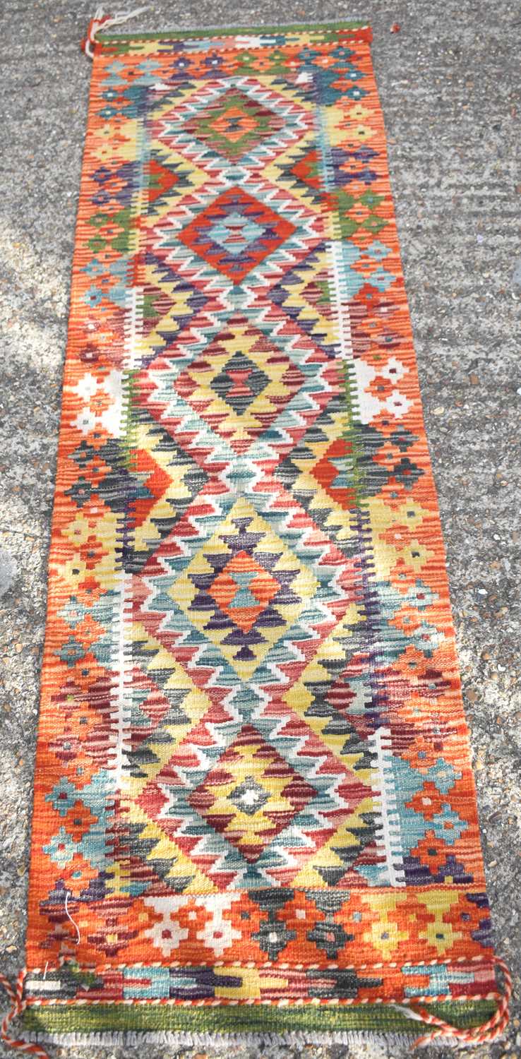 Lot 147 - A handmade Chobi Kilim runner, 203 x 60cm.