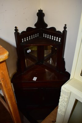Lot 1002 - A late 19th century stained pine freestanding...