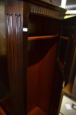 Lot 1010 - An oak hall robe, the single door with...