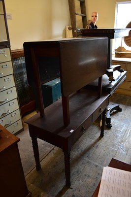 Lot 1022 - A 19th century writing table with two dummy...