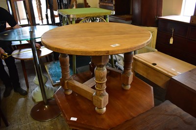 Lot 1030 - A modern pine coffee table, diameter of top 70cm.