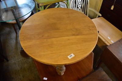 Lot 1030 - A modern pine coffee table, diameter of top 70cm.