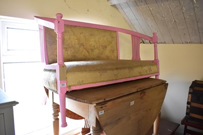 Lot 1034 - An Edwardian pink painted settee on turned...