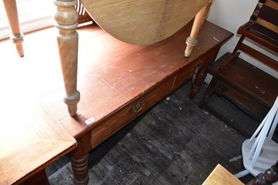 Lot 1036 - An old pine farmhouse kitchen table with two...