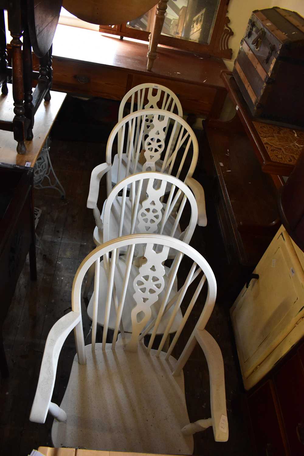 Lot 1040 - Four blue painted wheel back kitchen chairs...