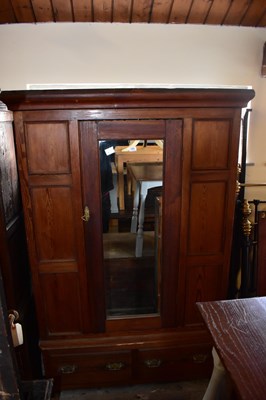Lot 1063 - A Victorian pitch pine wardrobe with moulded...