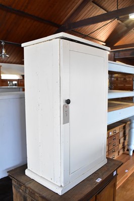 Lot 1084 - A modern hardwood cabinet with cast iron door...